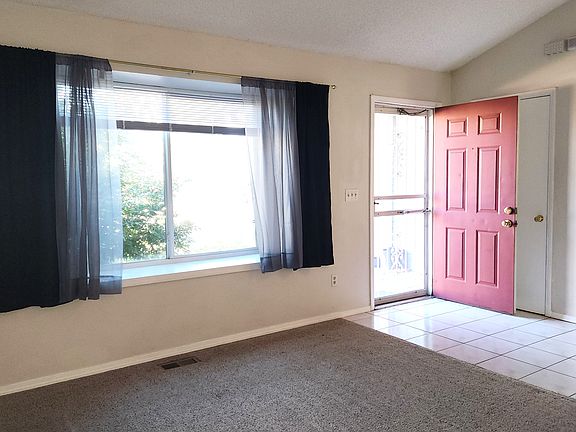 Front door and bay window in the living room