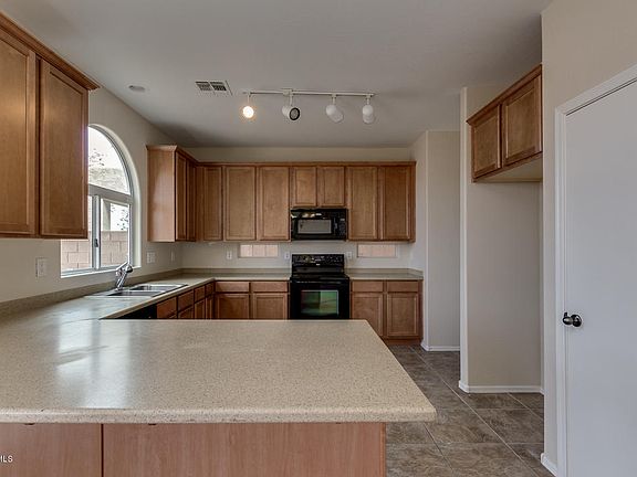 2nd image of 10496 E Primrose Ln