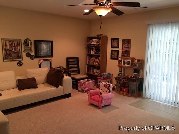 Spacious Den Opens to Patio