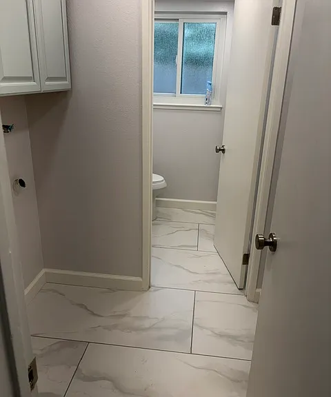 Lower level family room laundry and half bath
