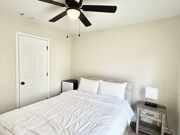 Private room w Queen bed, brand new mattress, desk and personal mini fridge.