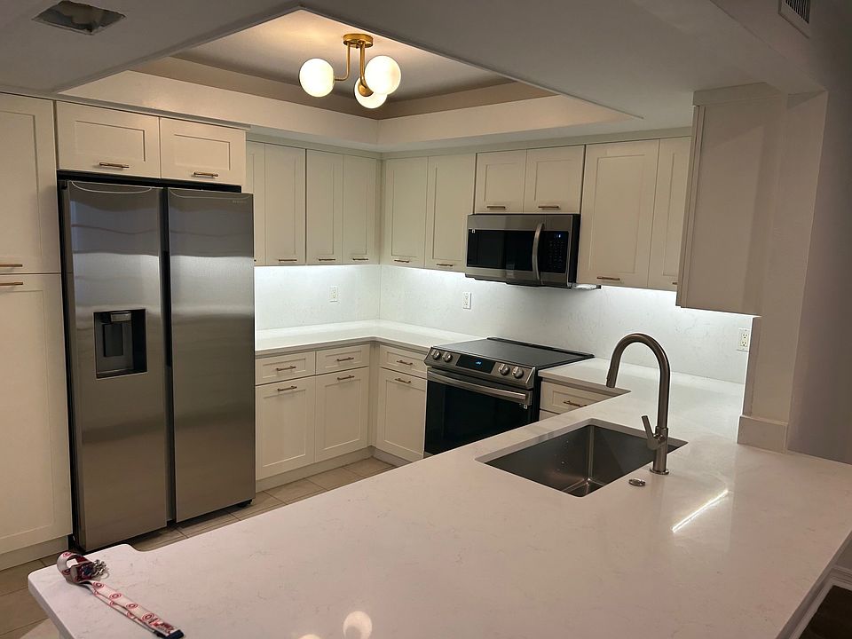 New appliances, fixtures, cabinets, countertops, and lighting.