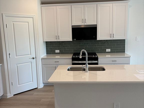 5th image of 5707 Rushing River Way
