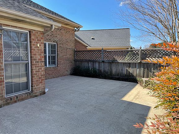 Fenced patio area- alternate view.