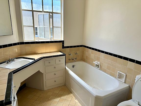 bathroom with free standing bathtub