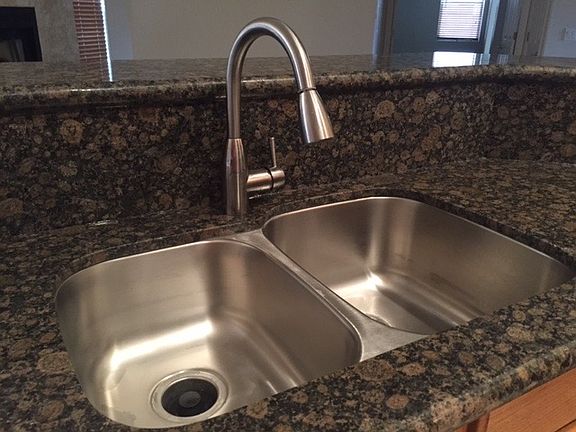 Stainless sinks and highrise faucet