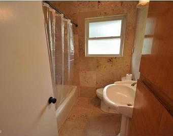 Travertine full bathroom