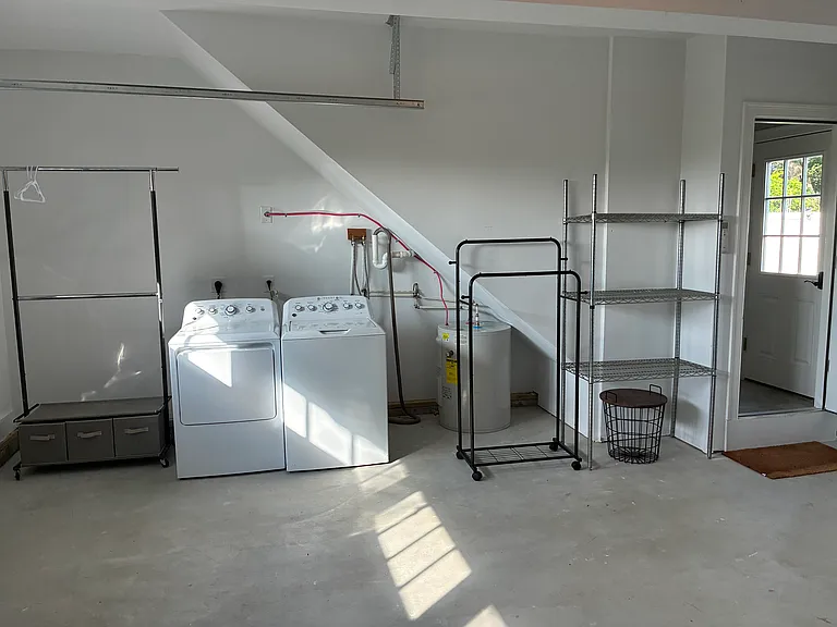 Washer and dryer and additional rack storage area