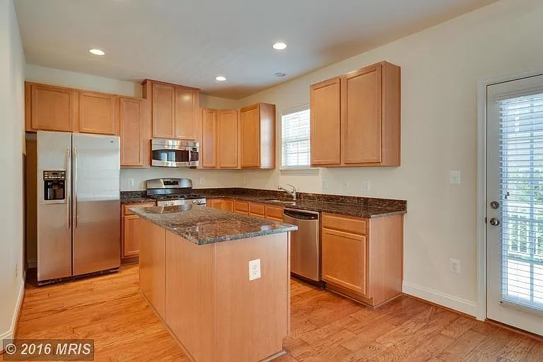Gourmet Kitchen- Stainless, Granite and tall cabinets