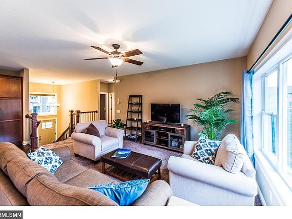 Main floor living/family space with large window for natural light.
