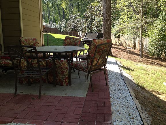 Concrete and Brick Patio with afternoon shade!