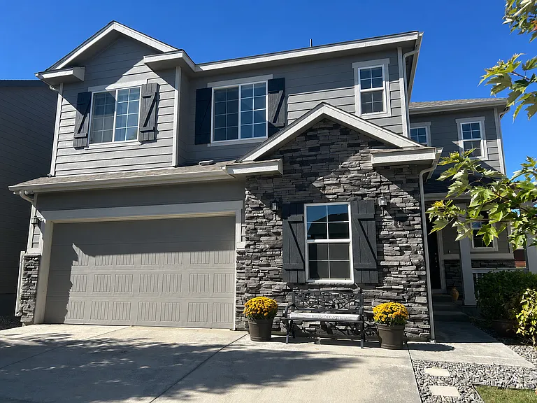Exterior of the spacious owner-occupied home. Tenant access includes designated shared spaces; basement is owner-private.