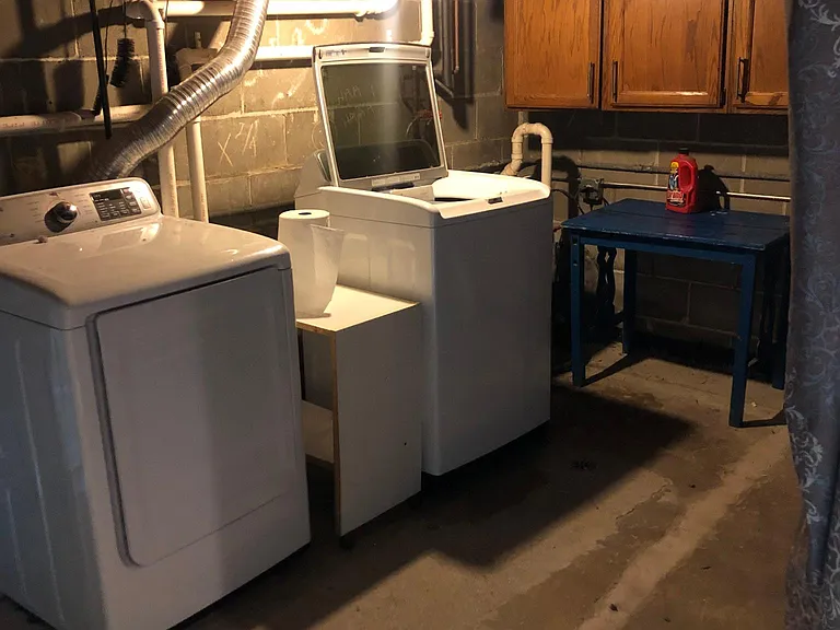 Basement washer and dryer hook-ups and currently has a washer and dryer to use.