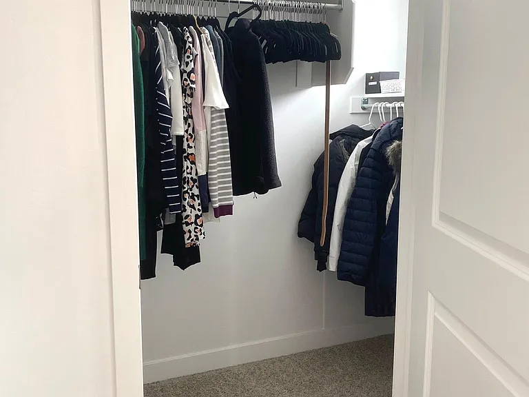 Her Closet in Master bedroom