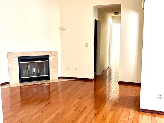 Living Room with cathedral ceilings and fireplace