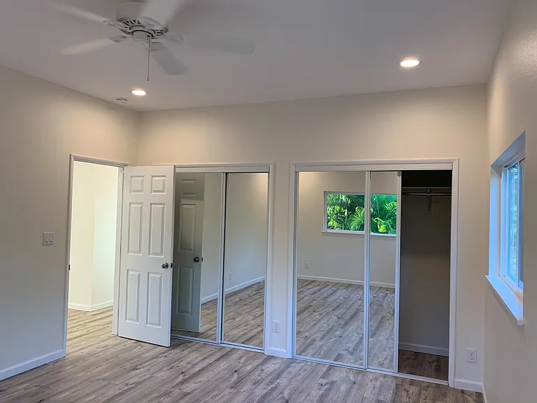 the same bedroom looking back to the closet