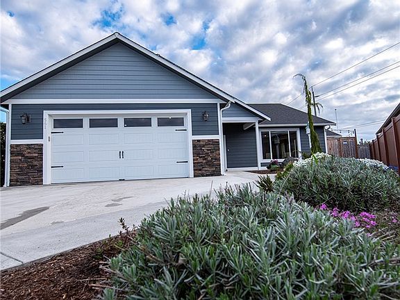 This very modern and contemporary home appeals to people of all ages who want a newer and low maintenance home.  Hardi plank siding, concrete walkways, excellent roof,  manufactured hardwood and tile floors inside all contribute to a low maintenance life style.