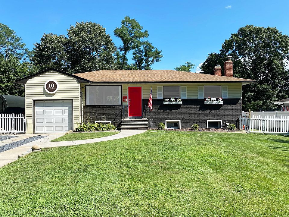 Front of house faces west, rear of home faces east. Home sits on a landscaped quarter acre.