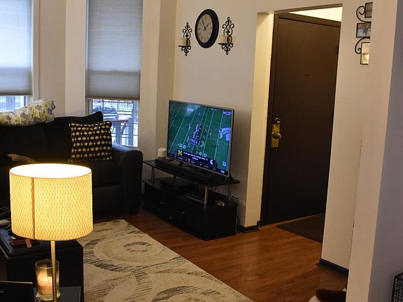 Living room and entrance with mud room