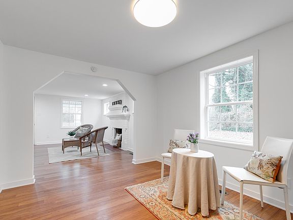 Distinctive archway between the dining and living room.