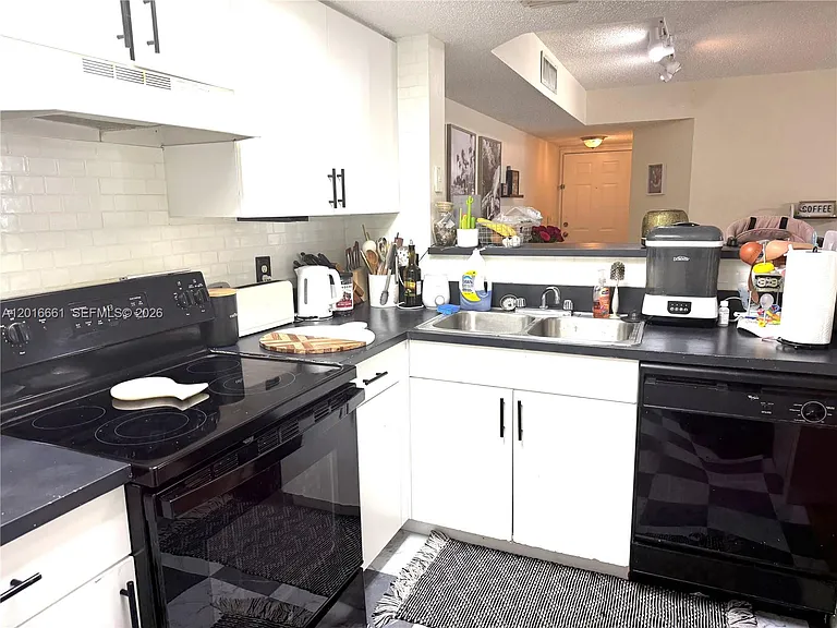 5045 Wiles Rd #201 — Photo 8
