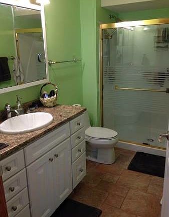 Bathroom is now a light grey/blue color