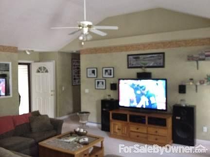 Living Room
						:
						Enough space for a large sectional couch and entertainment center