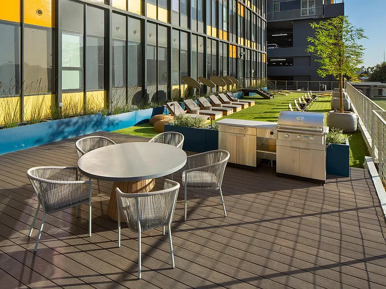 2nd floor patio with firepit and grills