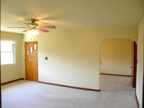 carpeted livingroom/hardwoods below