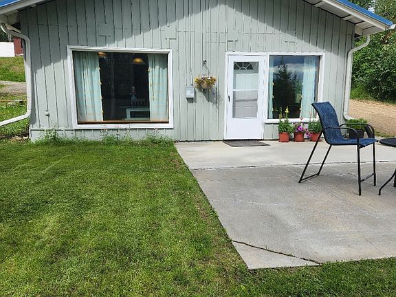 Front of cabin with patio