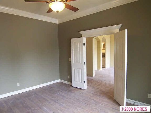 Formal Living to the immediate left of the entry can also be used as office