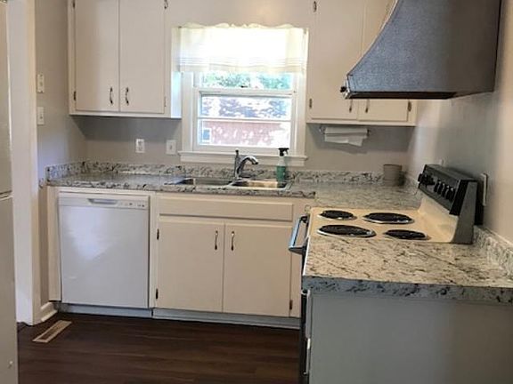 Kitchen with New countertops and dishwasher