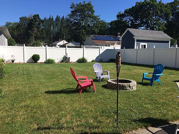 Vinyl fenced in backyard 