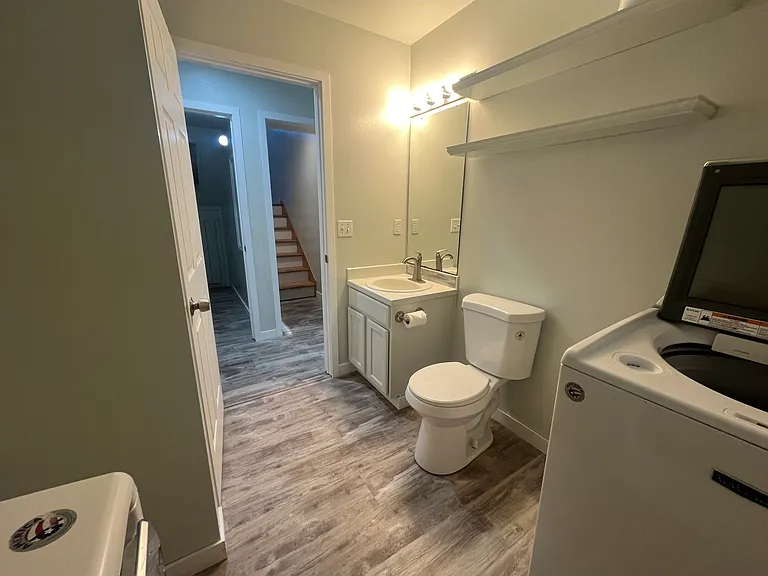 downstairs bathroom w/ laundry