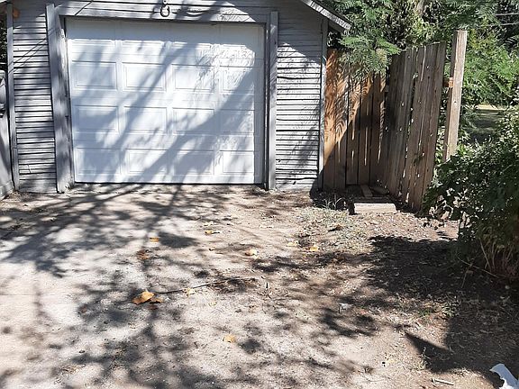Detached garage with new automatic garage door
