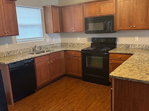 Kitchen - window overlooking backyard