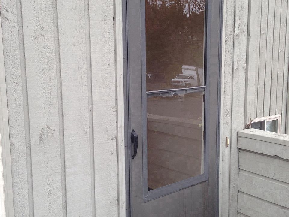 Front Door with old Storm Door. Storm Door is replaced