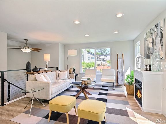 Modern railing leads to downstairs.