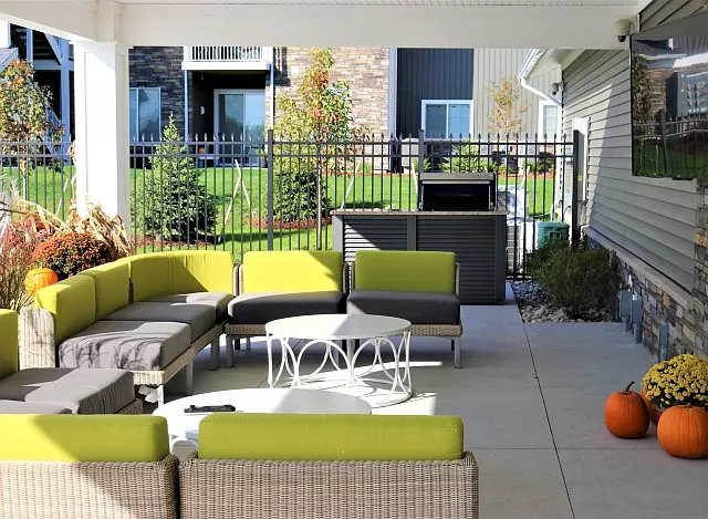 Outdoor lounge furniture with large outdoor tv and gas grill