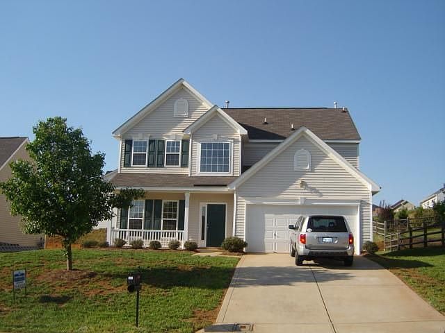 Front of house w/ NEW sod.