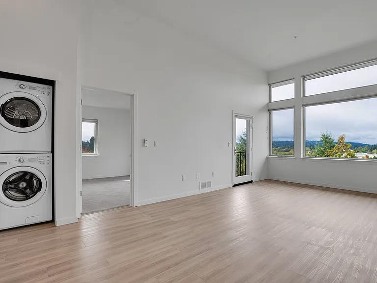 The 72nd Apartments | Living Area & Laundry