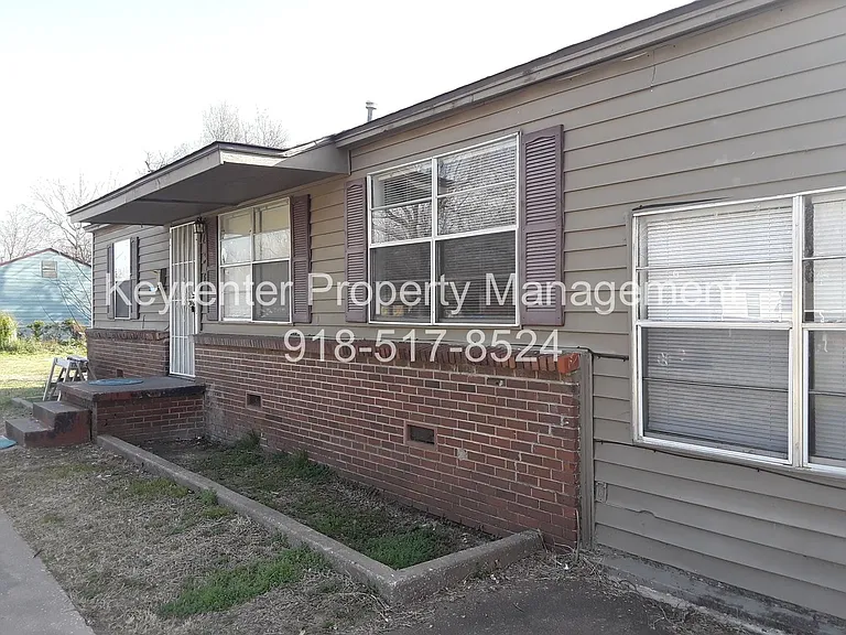 636 E 49th Pl N — Photo 1