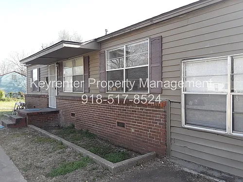636 E 49th Pl N Photo 1