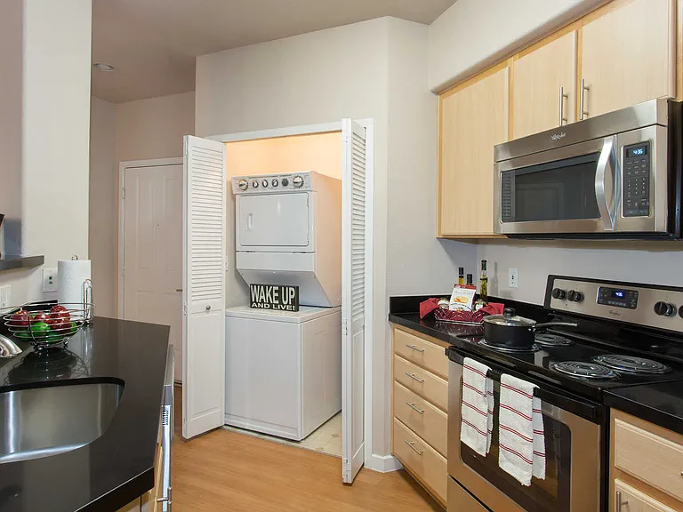 Kitchen with In-home Washer and Dryer