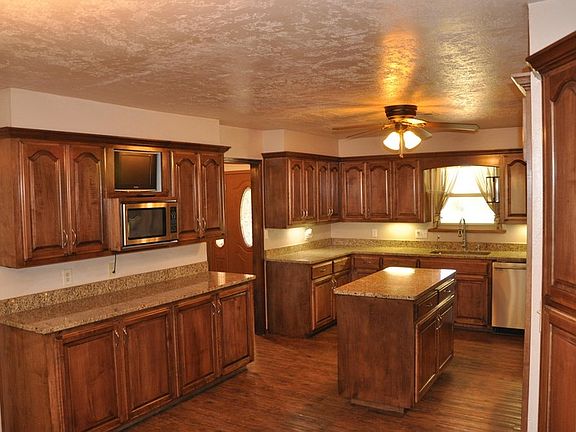 Kitchen
						:
						A chef's dream kitchen -- great layout with custom work throughout.