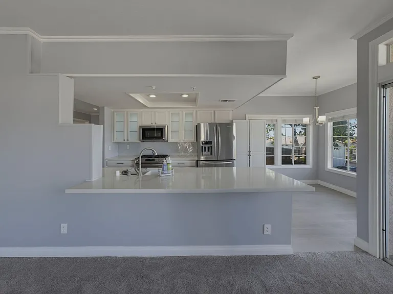 4591 Warner Ave #205 — Photo 19