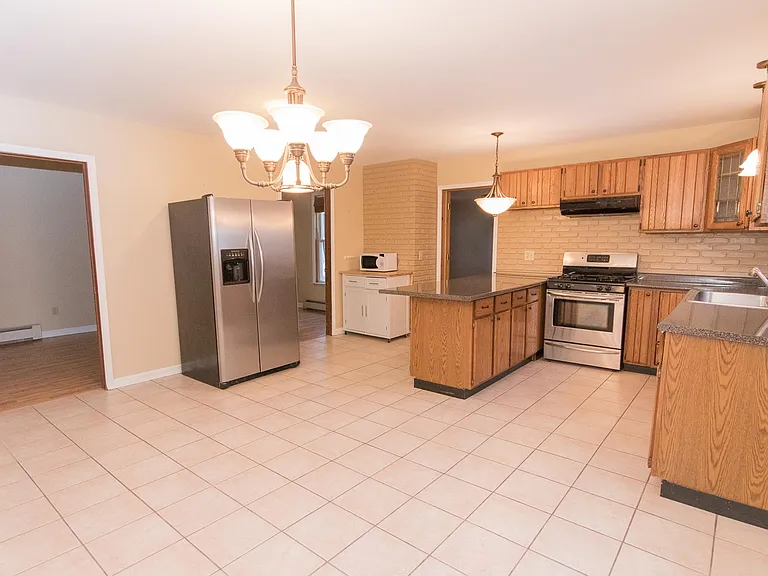 Office or bedroom, pantry, off the kitchen area.