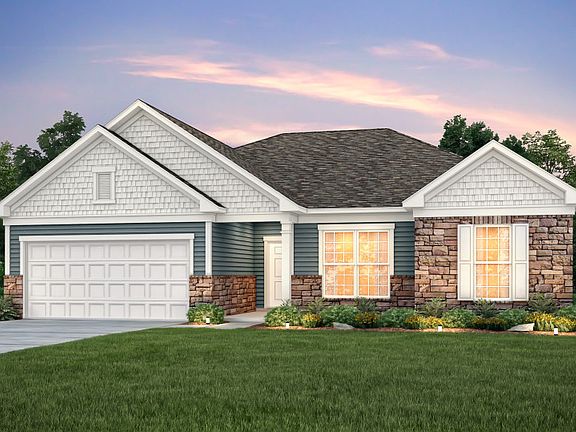 Amberwood Exterior 6 features stone, siding, shakes and covered front door