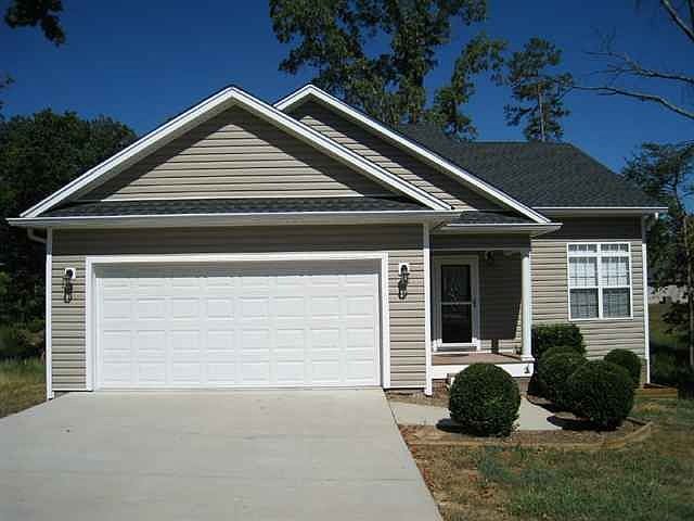 1st image of 1315 Woodland Cove Pl NE