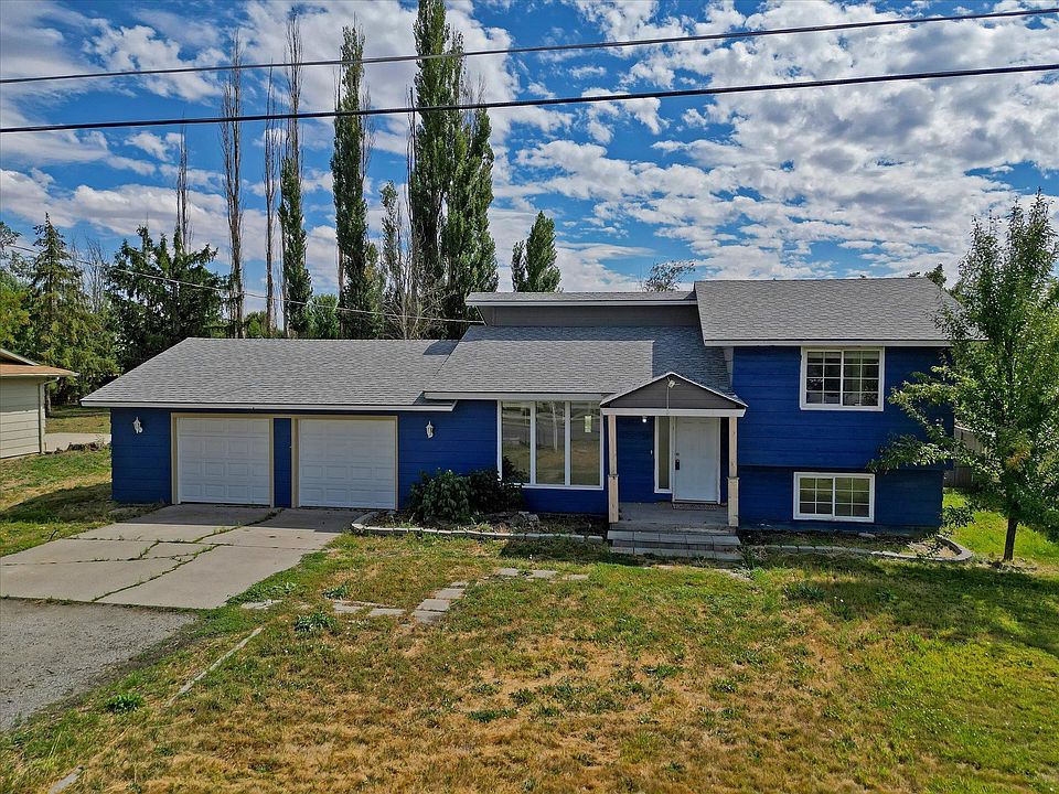 1st image of 3318 E 55th Ave